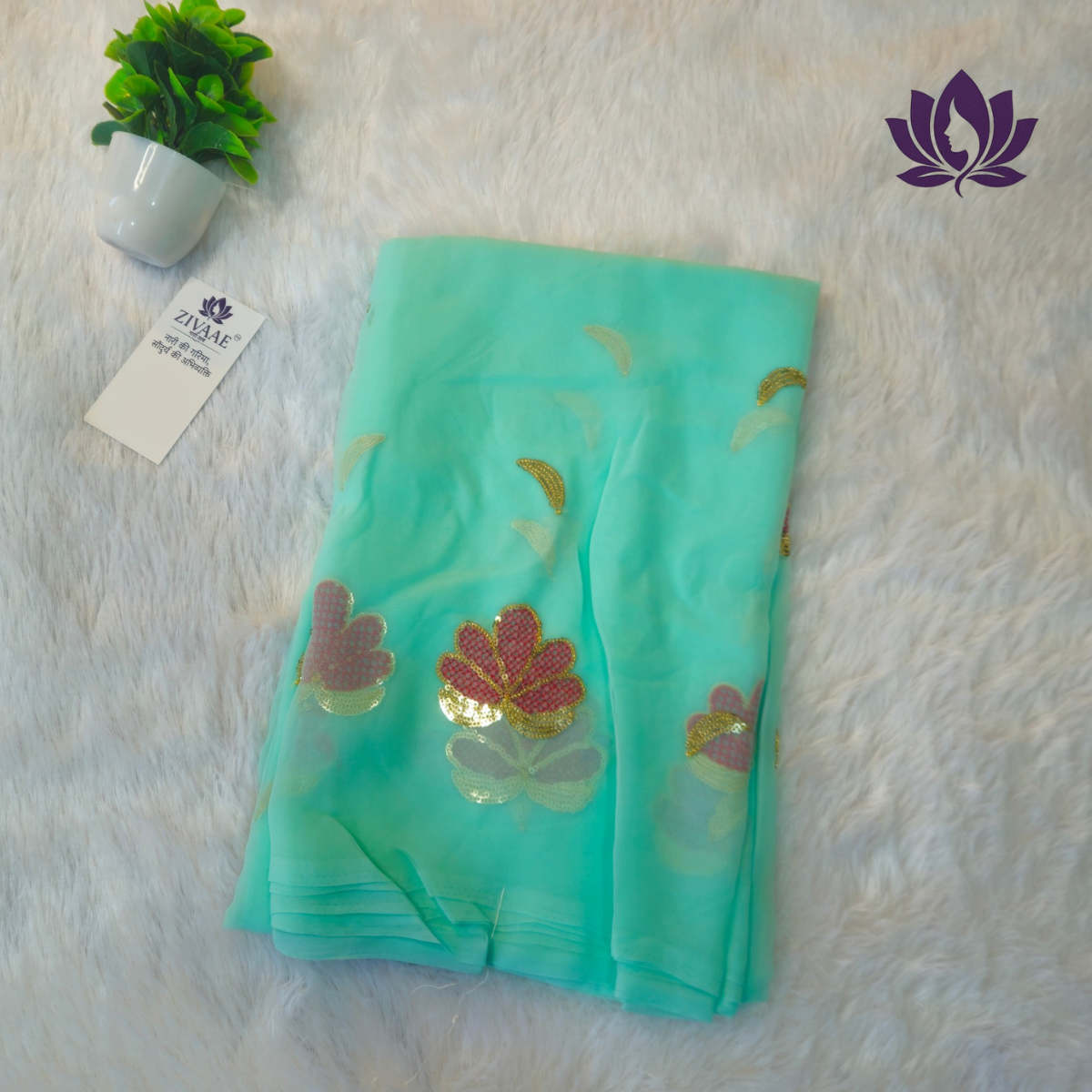 ZIVAAE Premium Butta Work Georgette Saree — a perfect blend of Rajputi Darbari elegance and modern minimal charm.