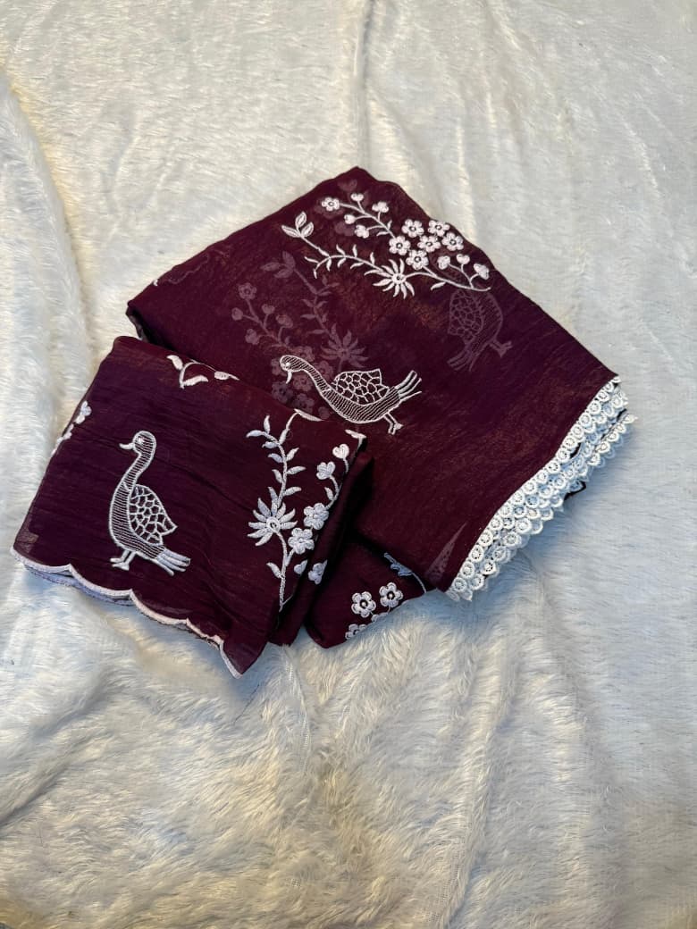 Crunchy chiffon fabric with white figured embroidary work allover saree with beautiful white rich cotton border on it with tone to tone white embroidary work blouse