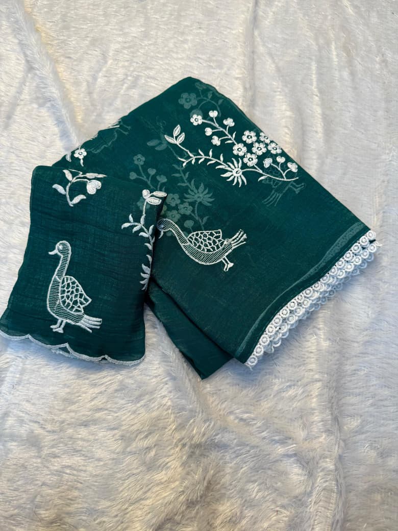 Crunchy chiffon fabric with white figured embroidary work allover saree with beautiful white rich cotton border on it with tone to tone white embroidary work blouse